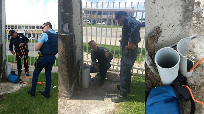 PolicÃ­as intentan rescatar un gato en Rio Piedras