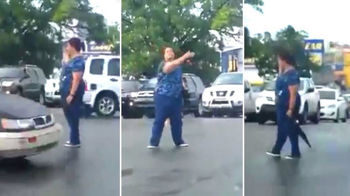 Video: Ante la falta de policÃ­as, Enfermera dirige el trÃ¡nsito en San Juan por las lluvias de hoy 