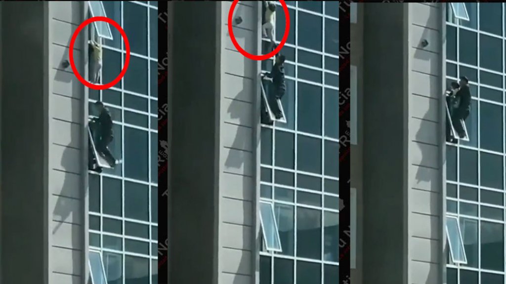  Video: momento en que hombre rescata niño que colgaba de una ventana a mas de 20 pisos de altura 