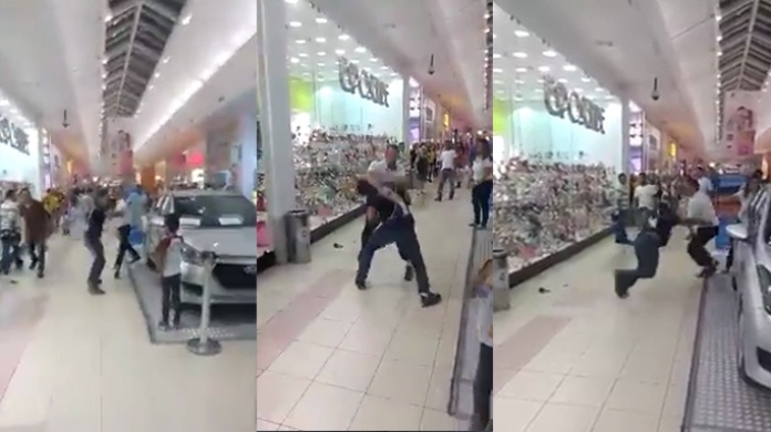 Video: A "puño limpio" dos hombres en centro comercial 