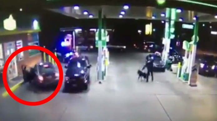 Video: Agente de policÃ­a arrastrado por auto robado mientras se fuga de gasolinera