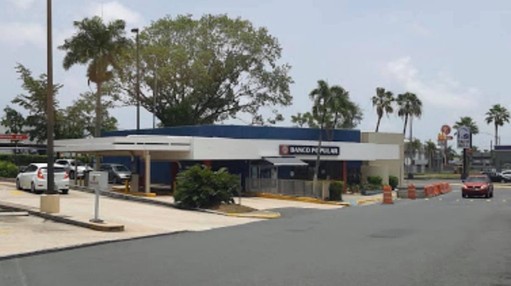  Fotos del asaltante herido de bala mientras intent&oacute; robar el banco popular de Trujillo Alto 