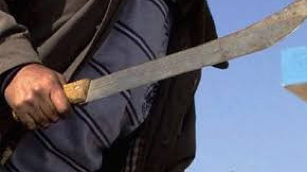  Padre agrede a su hijo con machete 