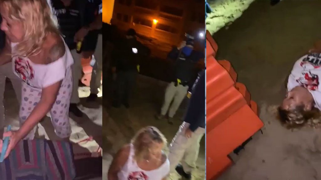  Video: Mujer se acuesta para evitar que polic&iacute;as limiten ares en playa de Rinc&oacute;n 