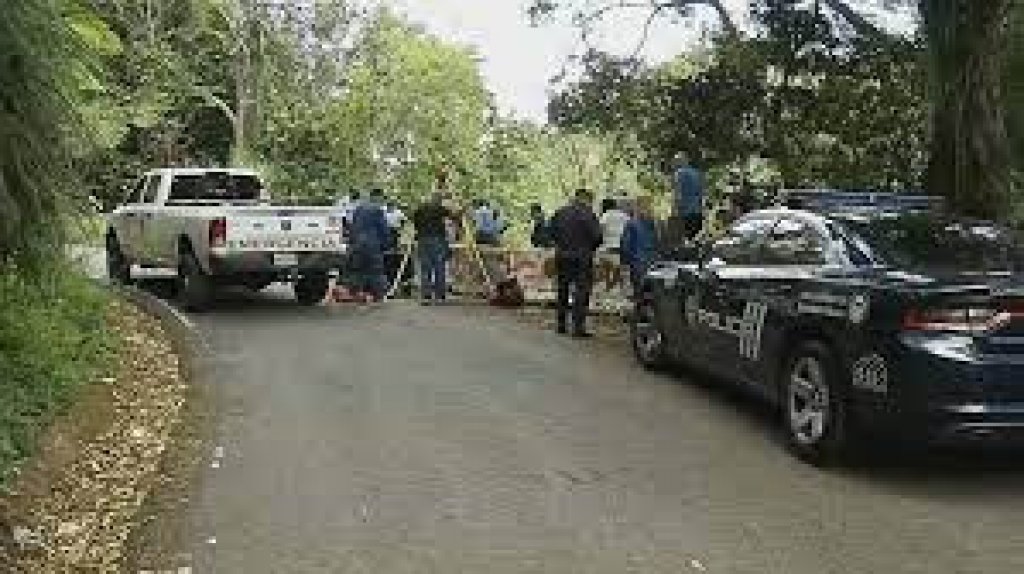  Encuentran cad&aacute;ver amarrado en risco de finca en Yauco 