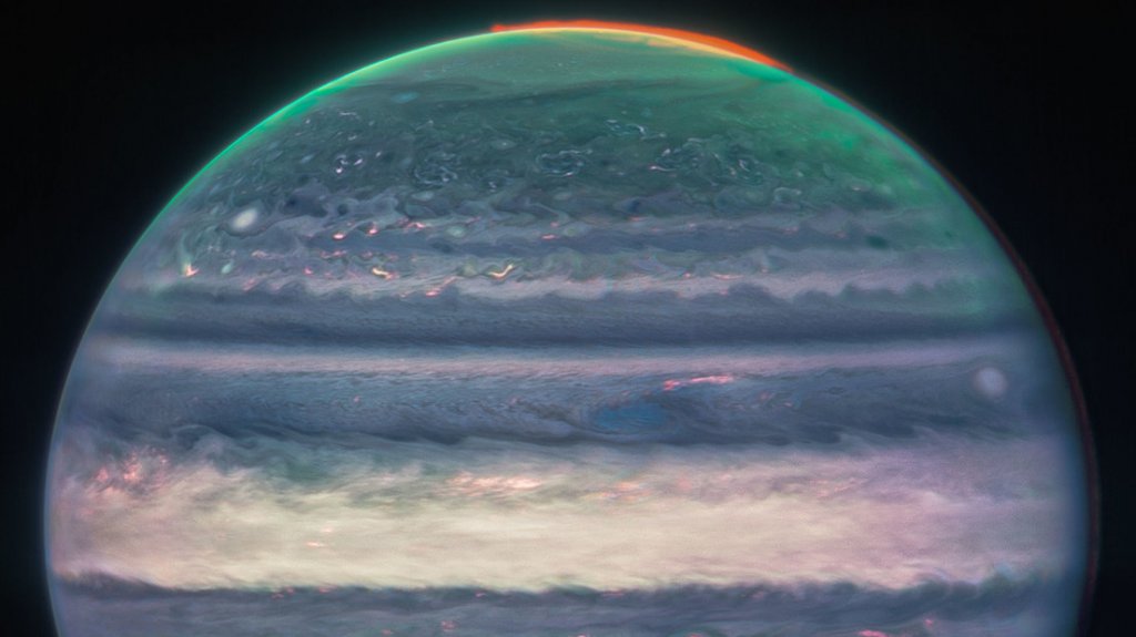  El telescopio espacial James Webb capta en una sola imagen a Júpiter junto con sus anillos, pequeños satélites e incluso galaxias 